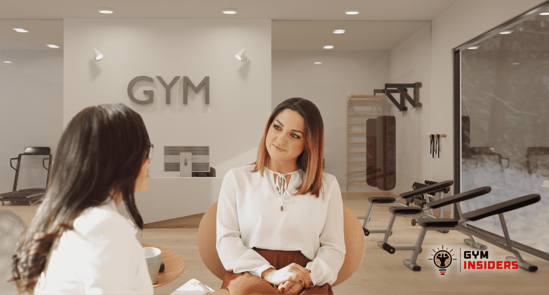 Gym Employee listening to member speak